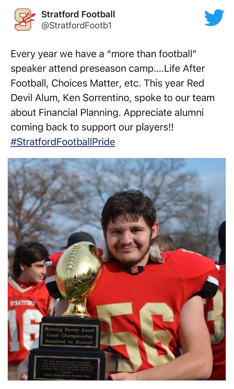  Ken Sorrentino, Jr. with a football trophy 